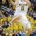Michigan senior Zack Novak takes the ball to the basket in the second half against Northwestern at Crisler Center on Wedensday. Melanie Maxwell I AnnArbor.com